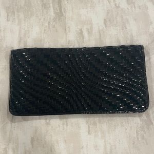 Cole Haan: suede and patent leather black clutch